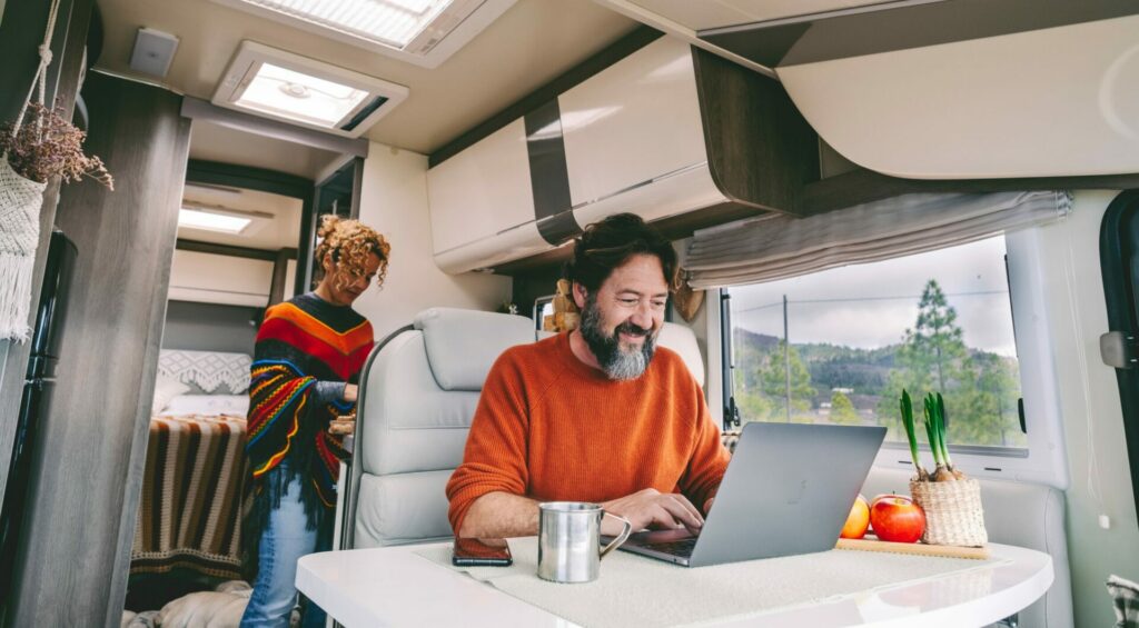 Couple Working in RV