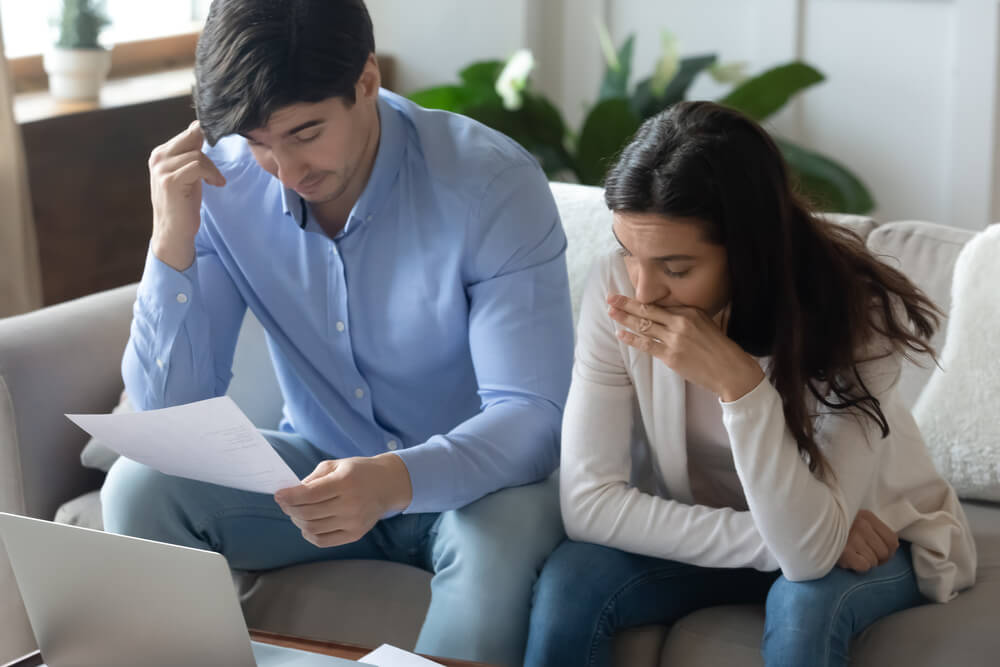 Man and woman looking at loan interest rates for boats and RV